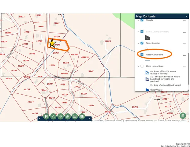 a sign that is sitting in the middle of a park