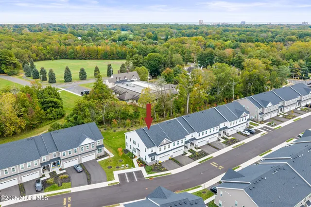 a view of a city with lawn chairs