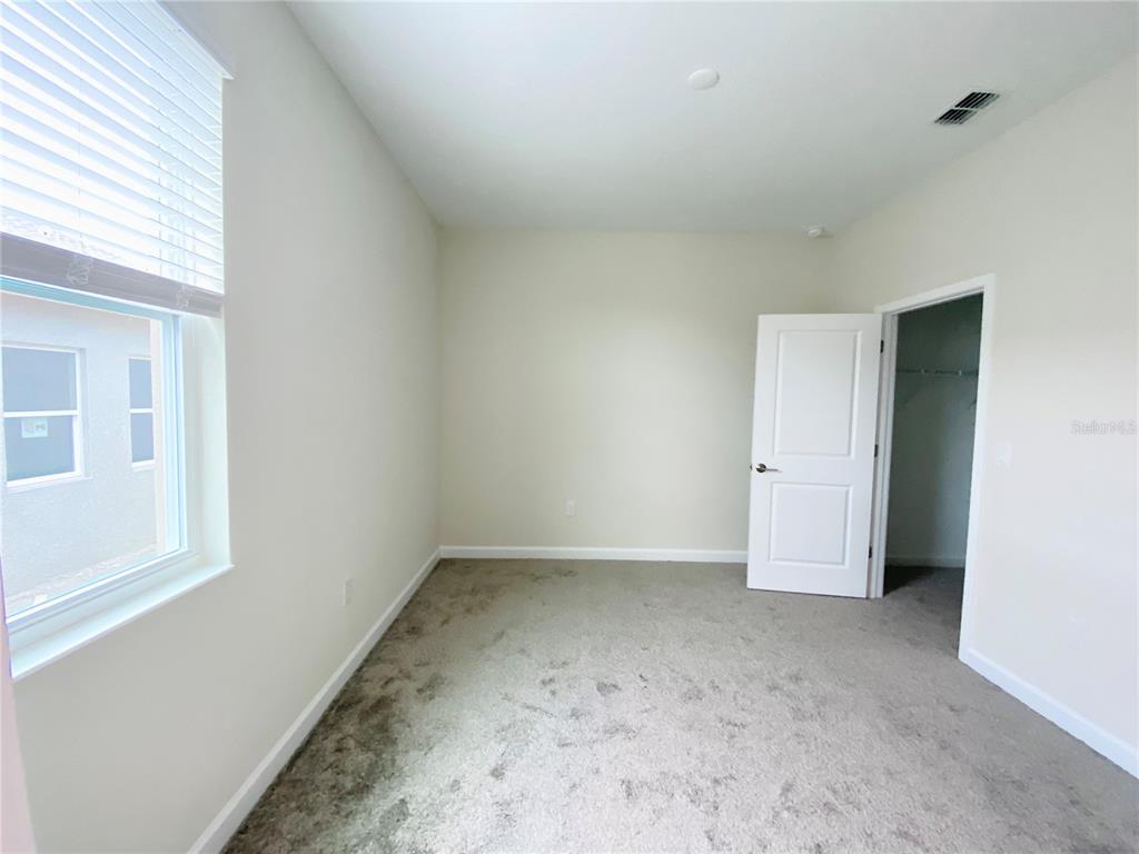 2768 Norway Maple Court Ocoee, FL 34761 - Photo 12 of 35 an empty room with a window