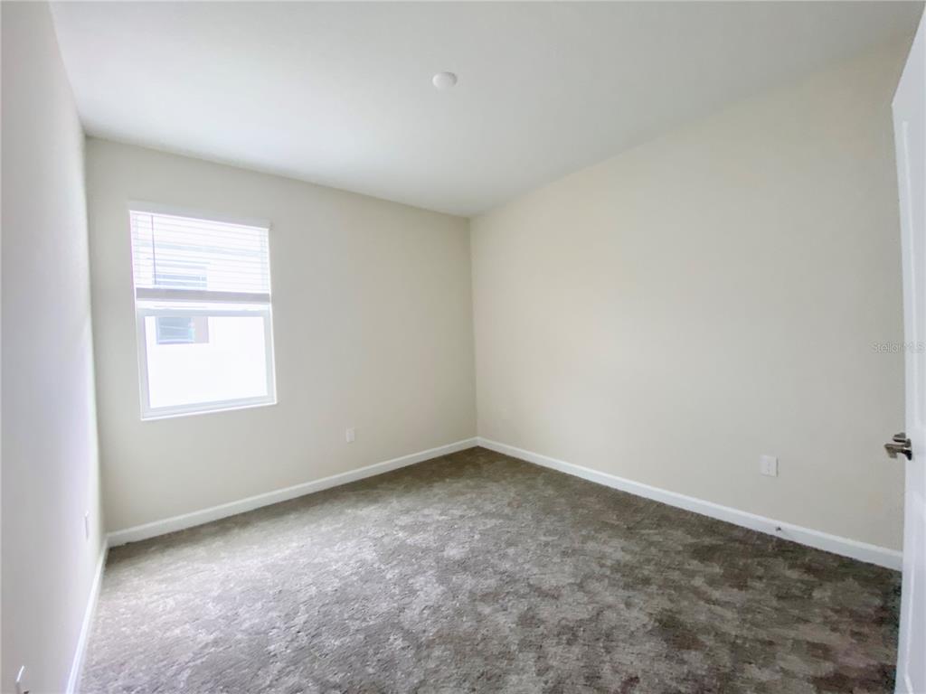 2768 Norway Maple Court Ocoee, FL 34761 - Photo 13 of 35 an empty room with a window