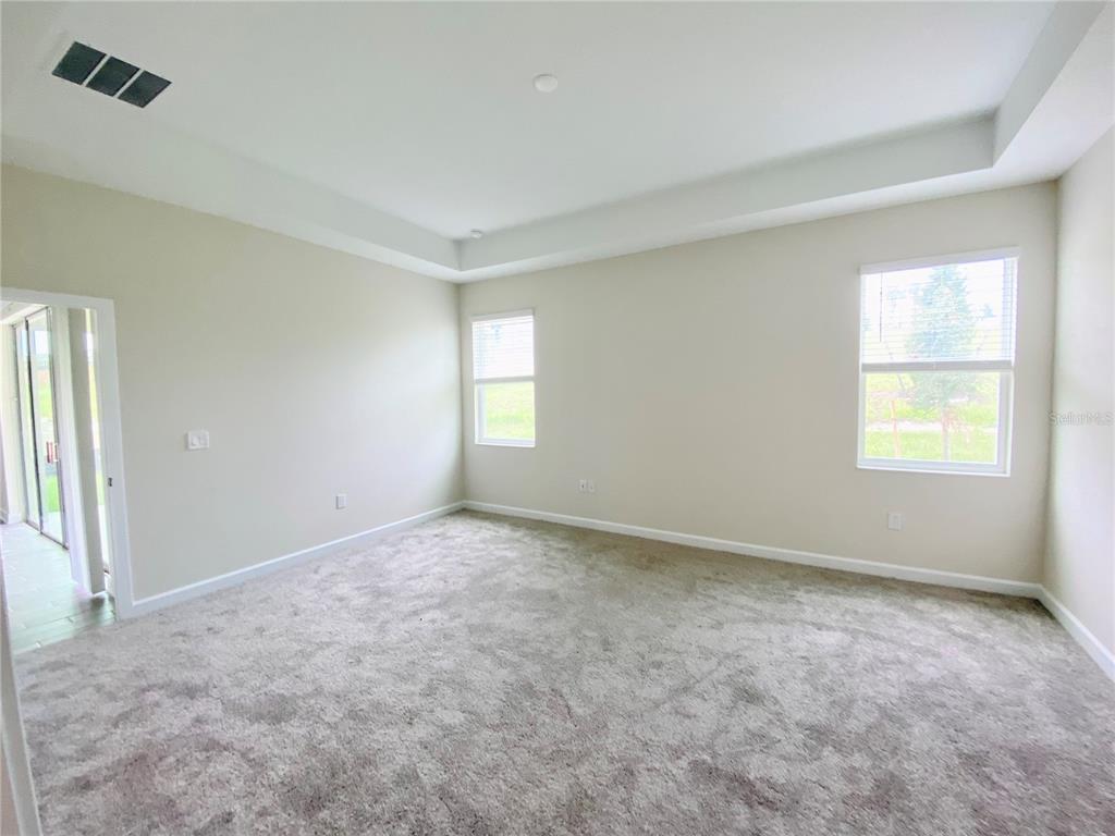 2768 Norway Maple Court Ocoee, FL 34761 - Photo 17 of 35 a view of an empty room with a window