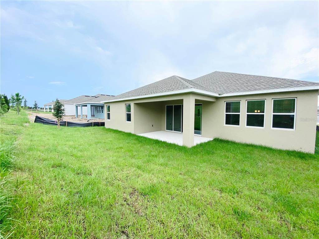 2768 Norway Maple Court Ocoee, FL 34761 - Photo 25 of 35 a house view with a garden space
