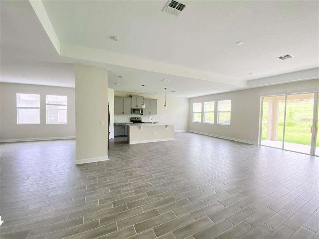 2768 Norway Maple Court Ocoee, FL 34761 - Photo 4 of 35 a view of livingroom and hardwood floor