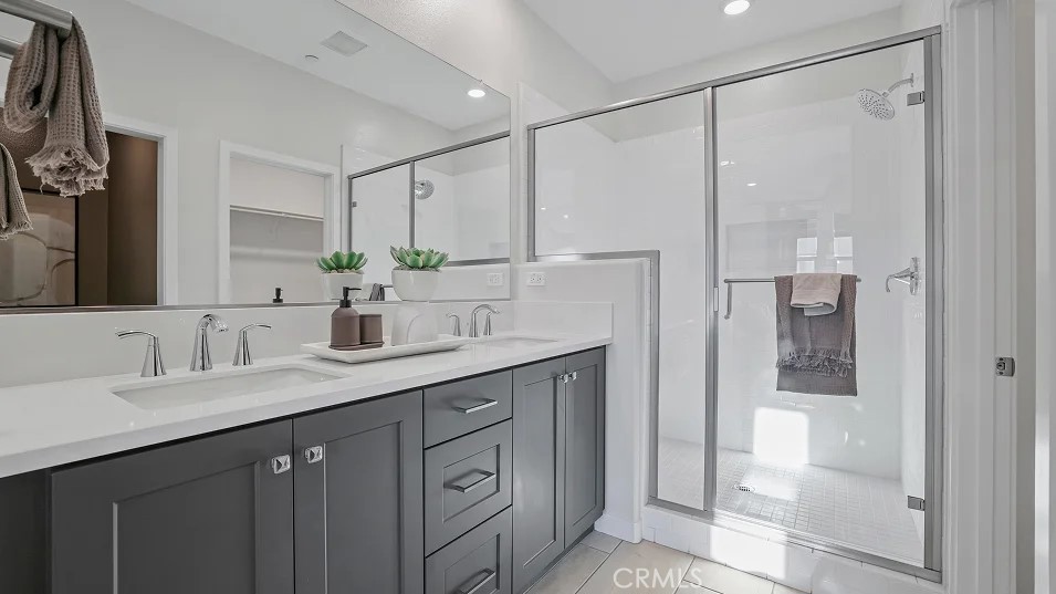 1135 Walnut Terrace Montebello, CA 90640 - Photo 12 of 30 a bathroom with a double vanity sink mirror and double