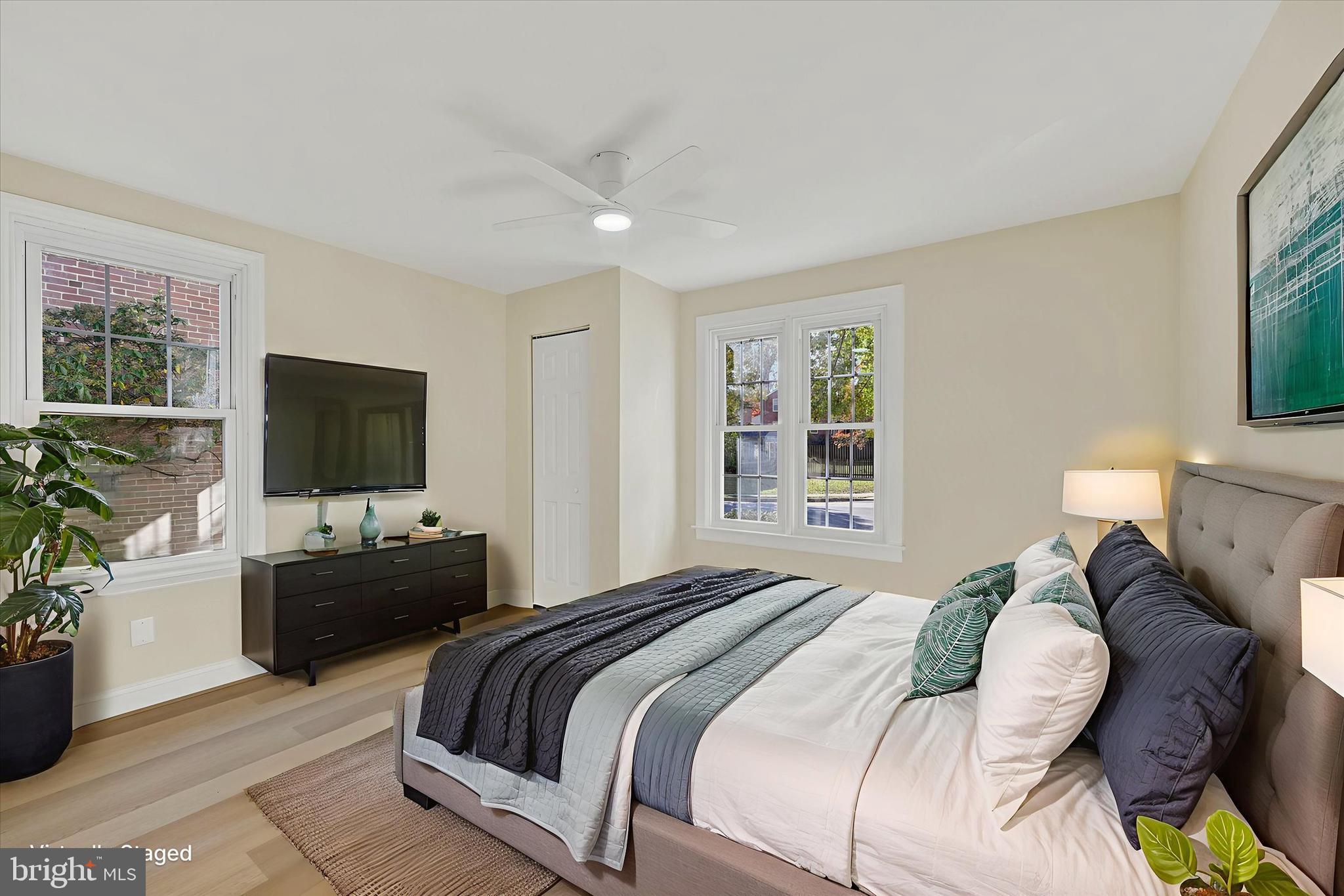 19 Dunmore Road Catonsville, MD 21228 - Photo 22 of 50 a bedroom with a bed and a flat screen tv