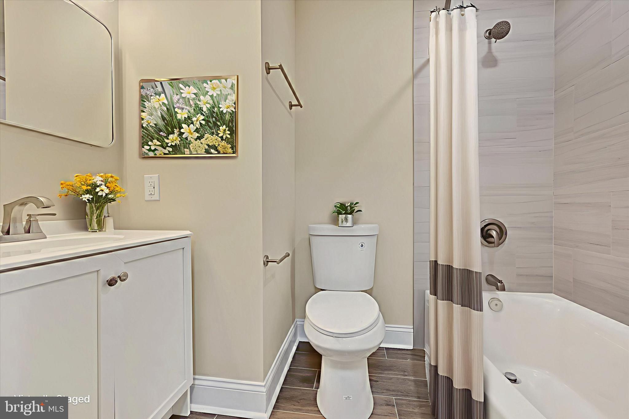 19 Dunmore Road Catonsville, MD 21228 - Photo 25 of 50 a bathroom with a sink toilet and shower