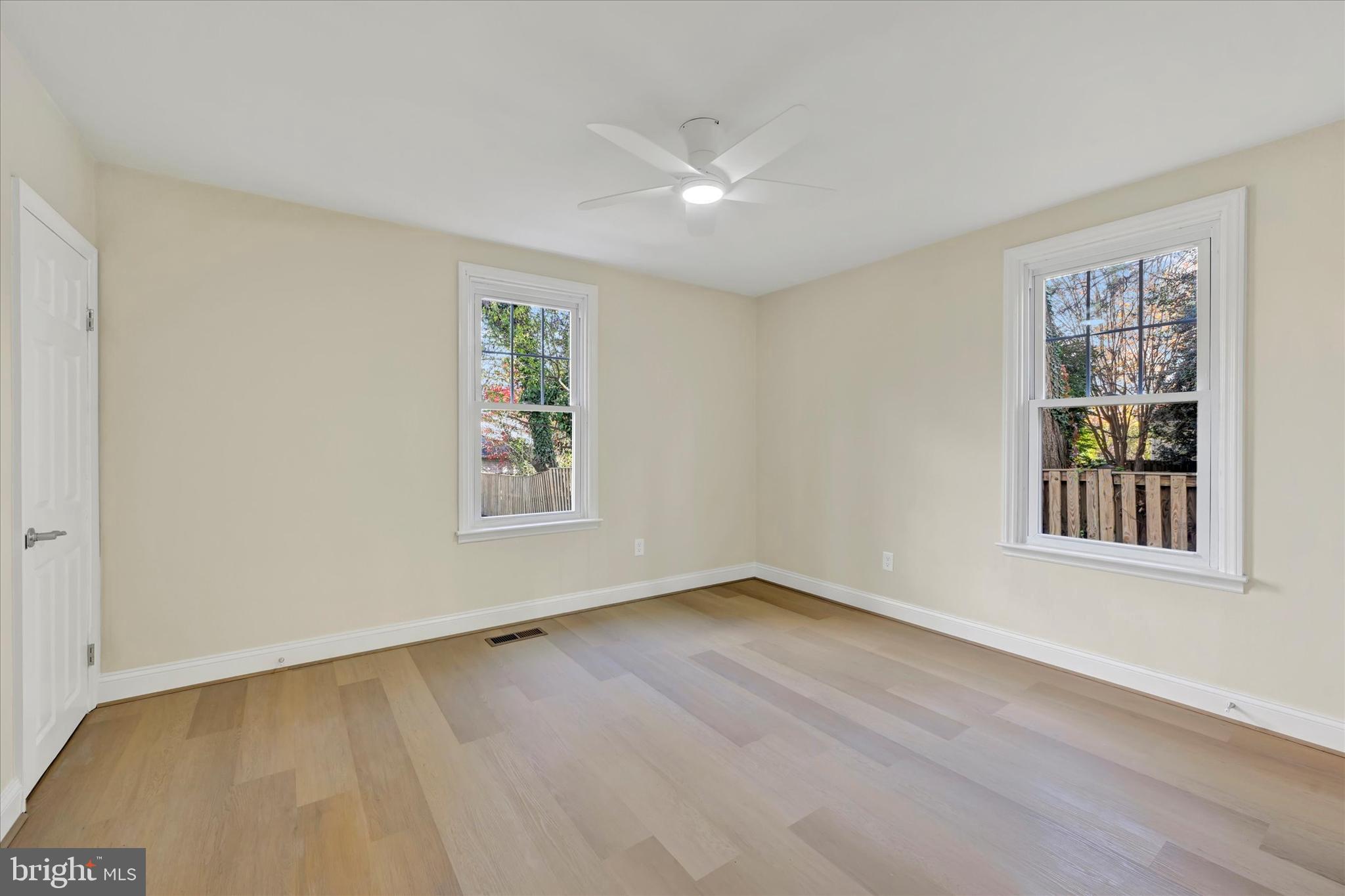 19 Dunmore Road Catonsville, MD 21228 - Photo 26 of 50 a view of an empty room with a window and wooden floor