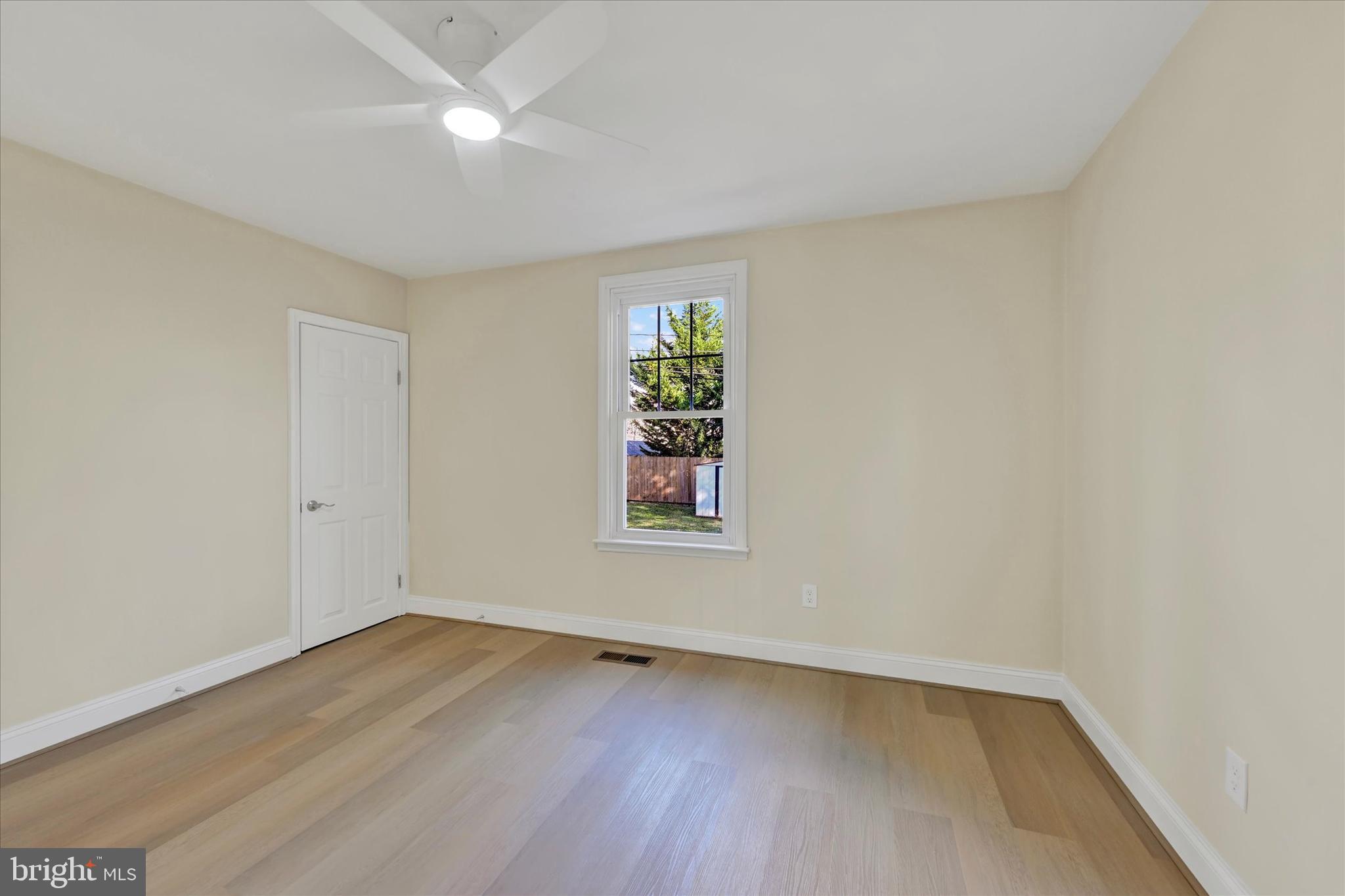 19 Dunmore Road Catonsville, MD 21228 - Photo 28 of 50 wooden floor in an empty room with a window