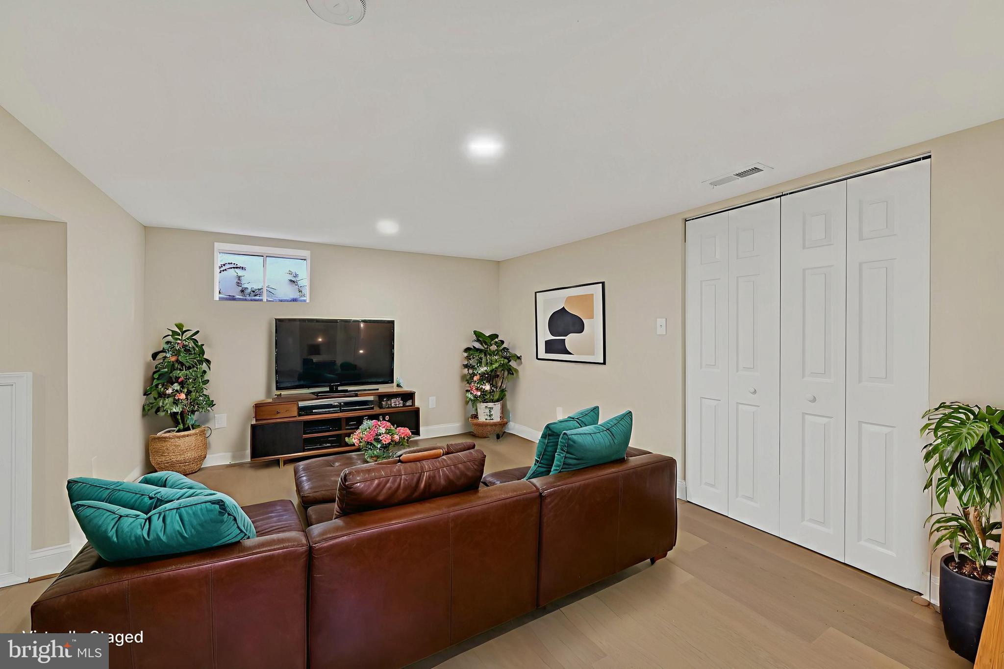 19 Dunmore Road Catonsville, MD 21228 - Photo 33 of 50 a living room with furniture and a flat screen tv