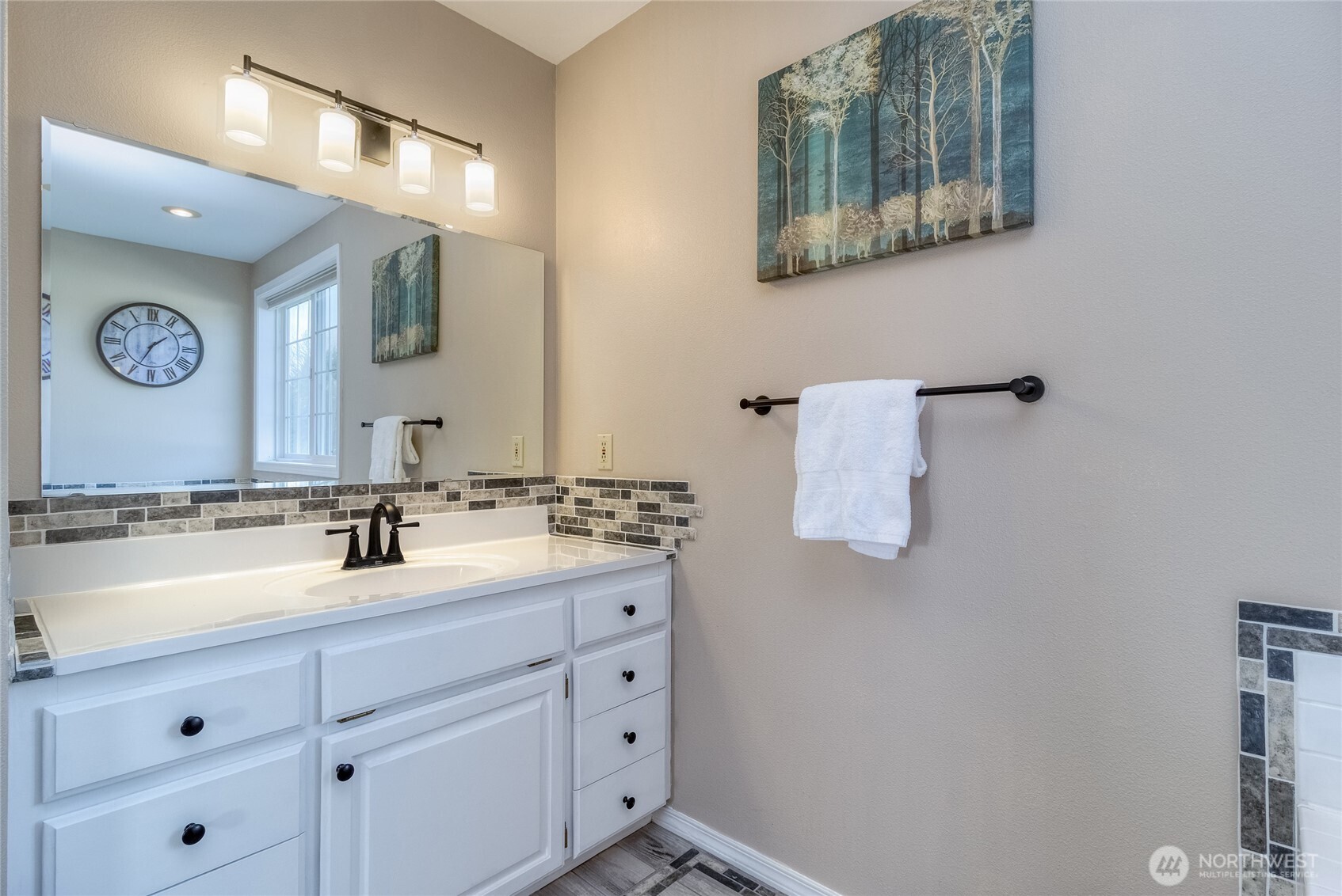 47 Austin Street Walla Walla, WA 99362 - Photo 18 of 40 a bathroom with a double vanity sink and a mirror