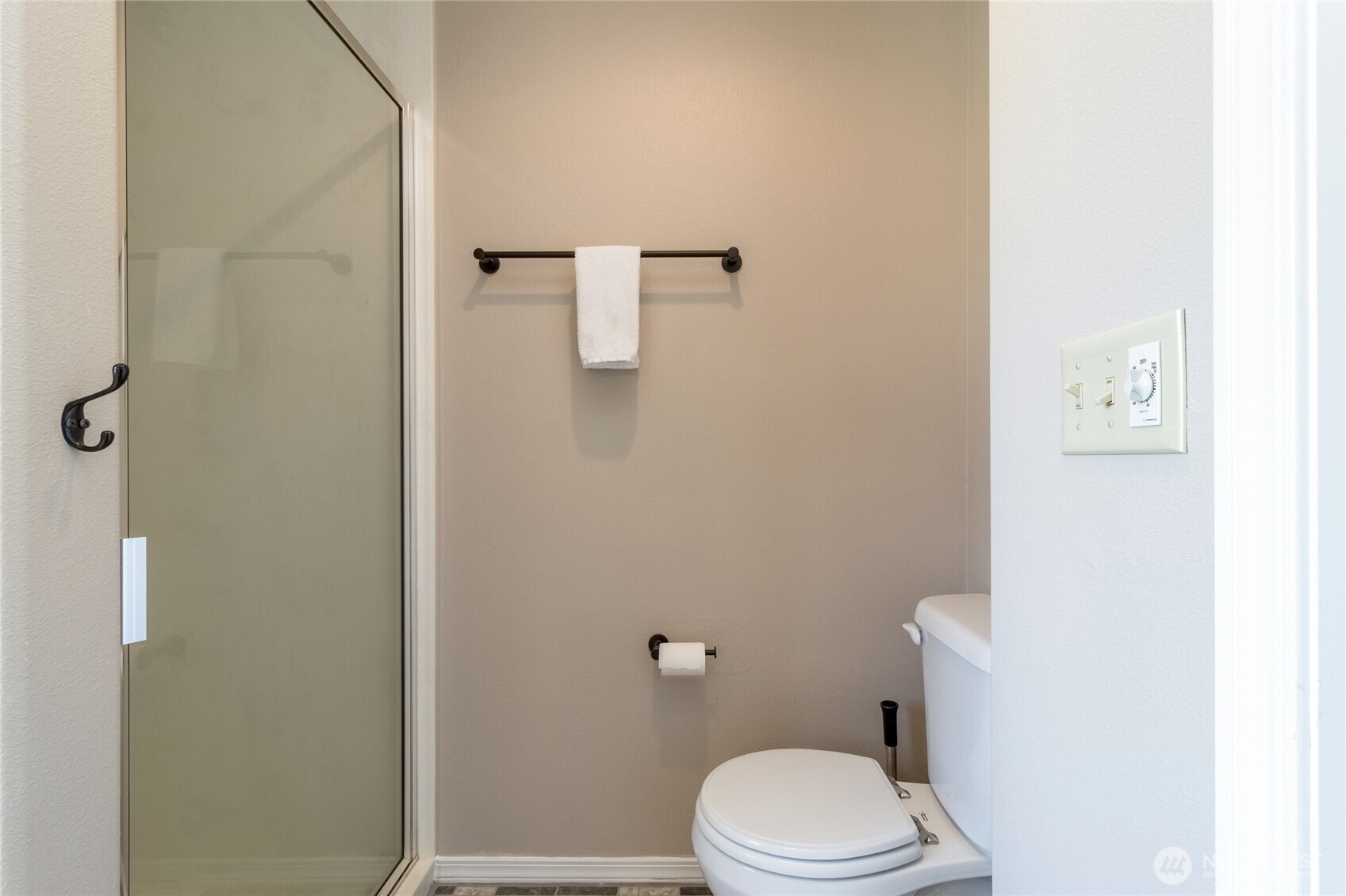 47 Austin Street Walla Walla, WA 99362 - Photo 20 of 40 a white toilet sitting next to a shower