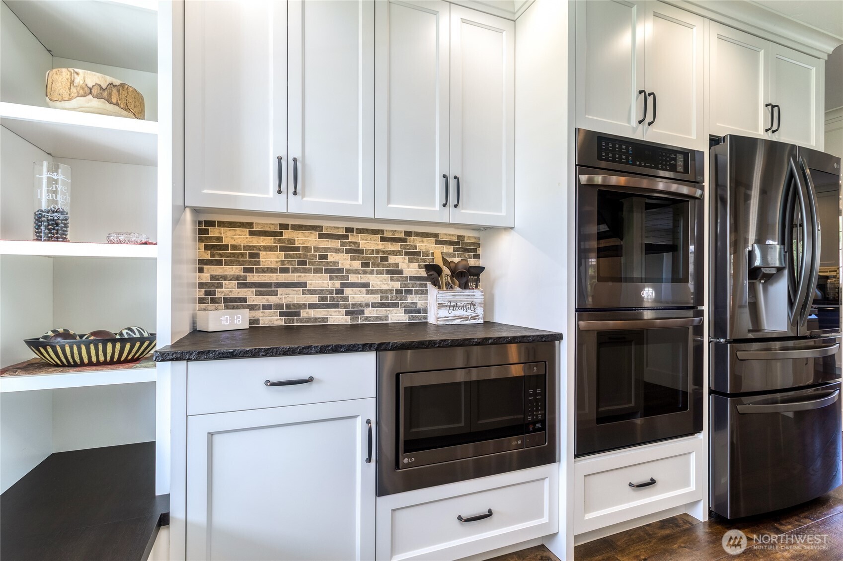 47 Austin Street Walla Walla, WA 99362 - Photo 9 of 40 a kitchen with granite countertop white cabinets and stainless steel appliances