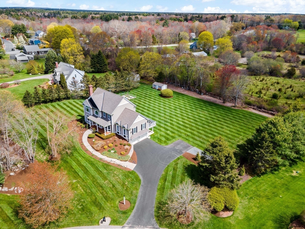 9 Round Farm Road Rehoboth, MA 02769 - Photo 3 of 41 a view of a lake with a yard