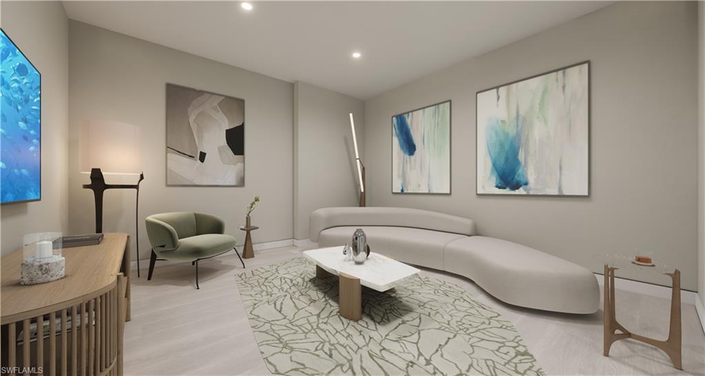 5000 Coconut Road, Unit 303 Bonita Springs, FL 34134 - Photo 24 of 27 a living room with furniture and a table