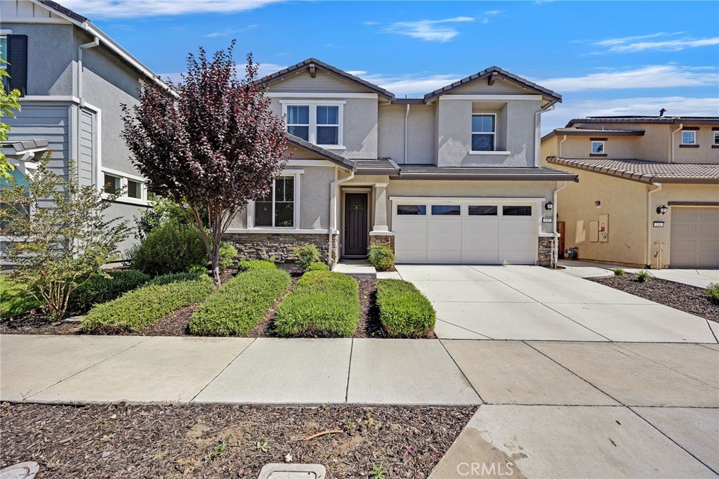 237 Goose Creek Avenue Brentwood, CA 94513 - Photo 1 of 49 a front view of a house with a yard and potted plants