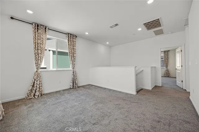 en empty room with windows