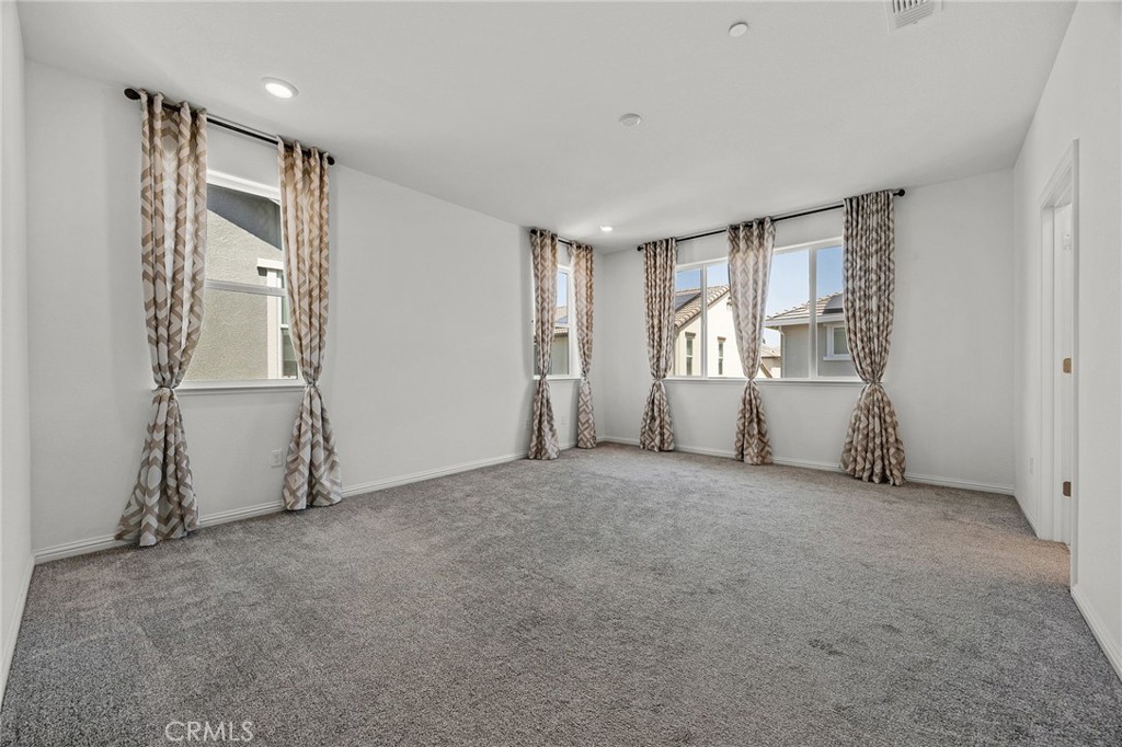 237 Goose Creek Avenue Brentwood, CA 94513 - Photo 22 of 49 a view of empty room with windows