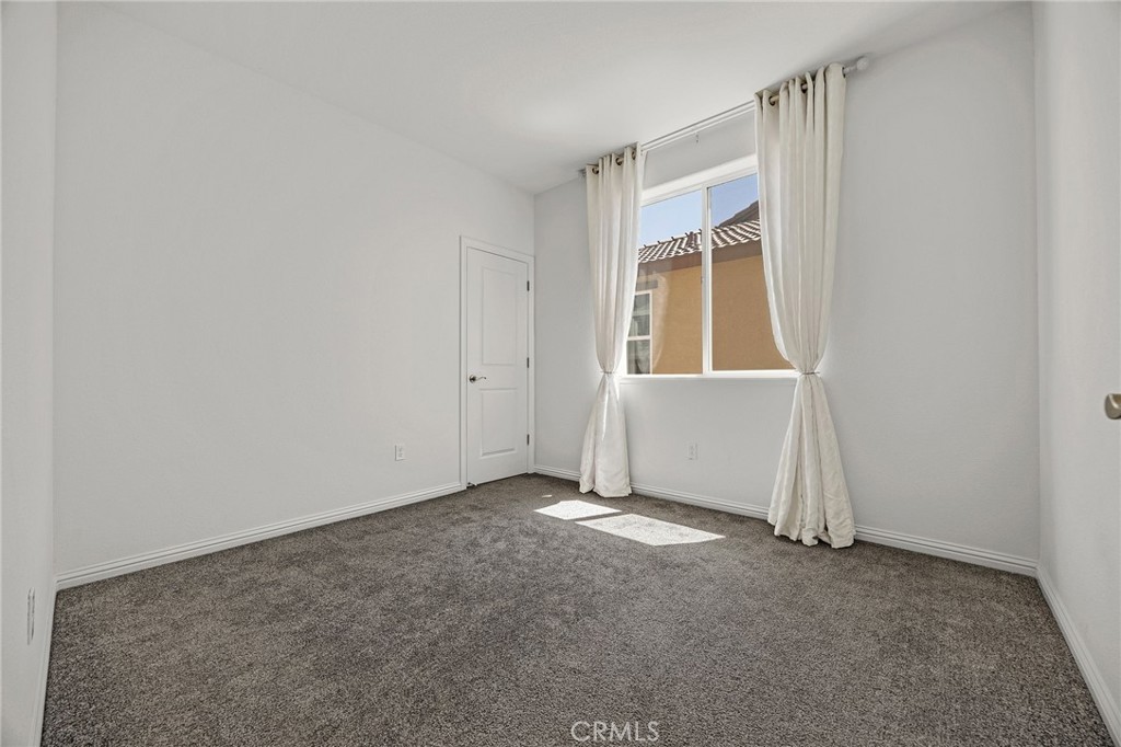 237 Goose Creek Avenue Brentwood, CA 94513 - Photo 26 of 49 an empty room with windows