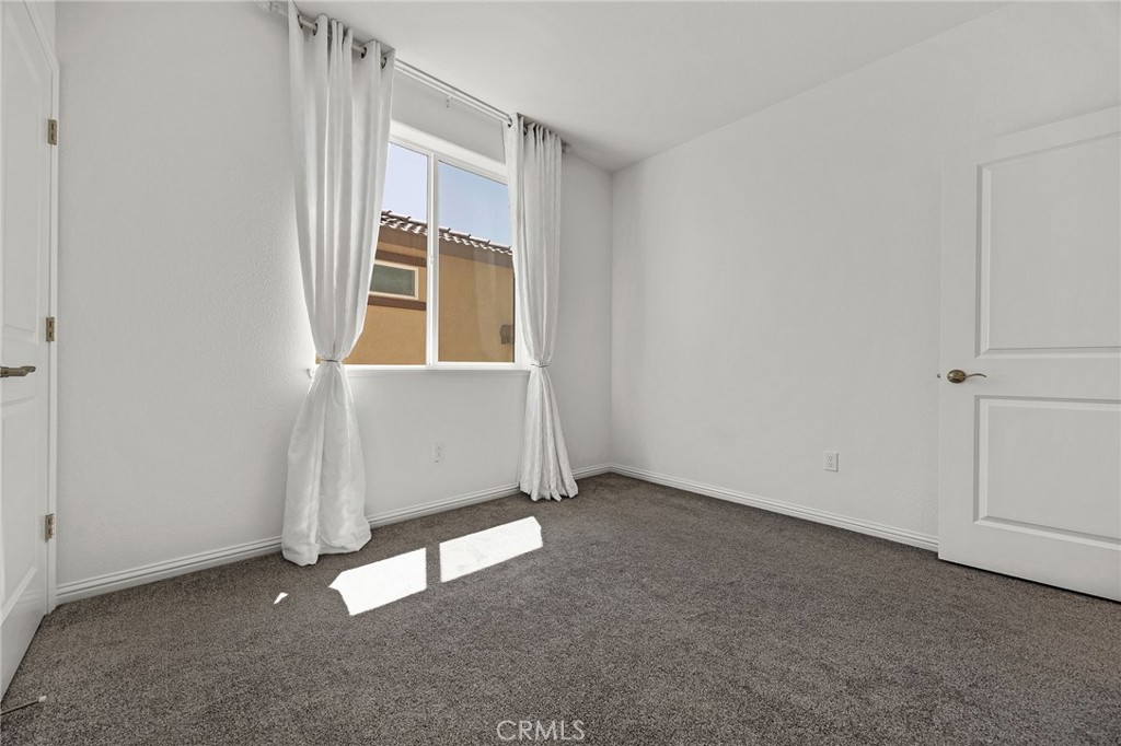 237 Goose Creek Avenue Brentwood, CA 94513 - Photo 28 of 49 an empty room with windows