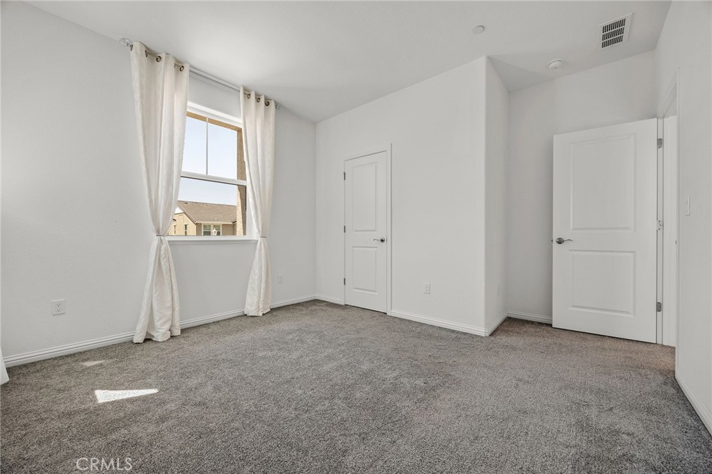 237 Goose Creek Avenue Brentwood, CA 94513 - Photo 29 of 49 an empty room with windows