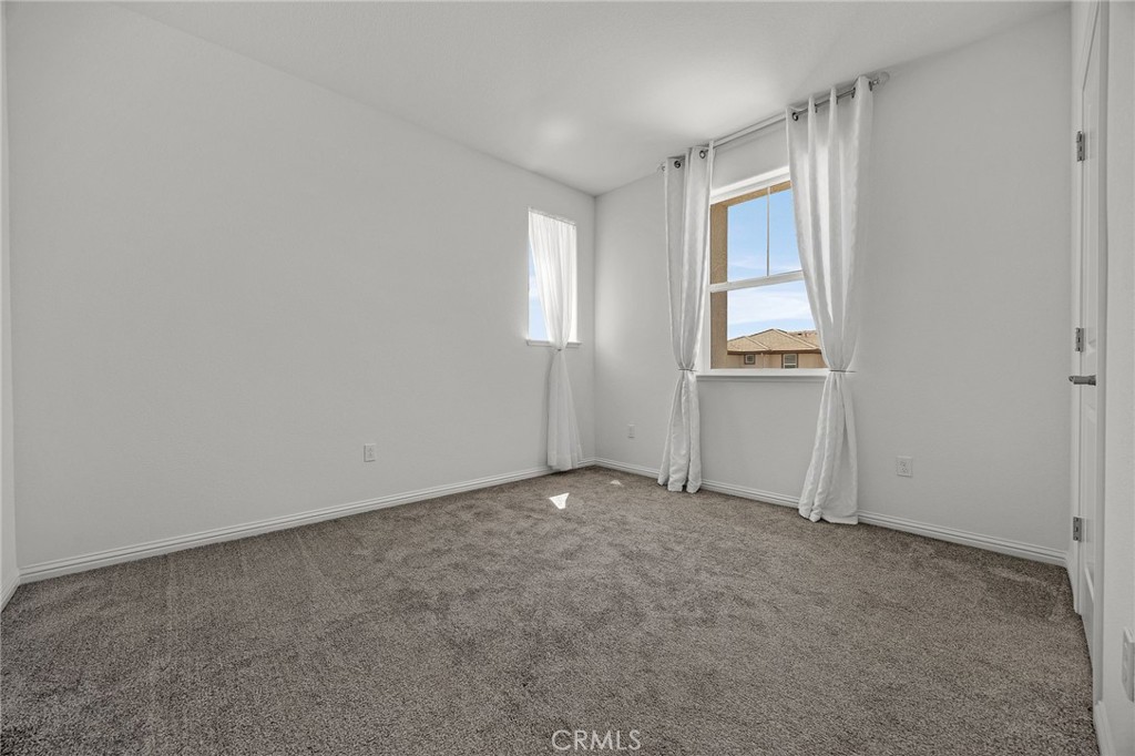 237 Goose Creek Avenue Brentwood, CA 94513 - Photo 30 of 49 an empty room with windows