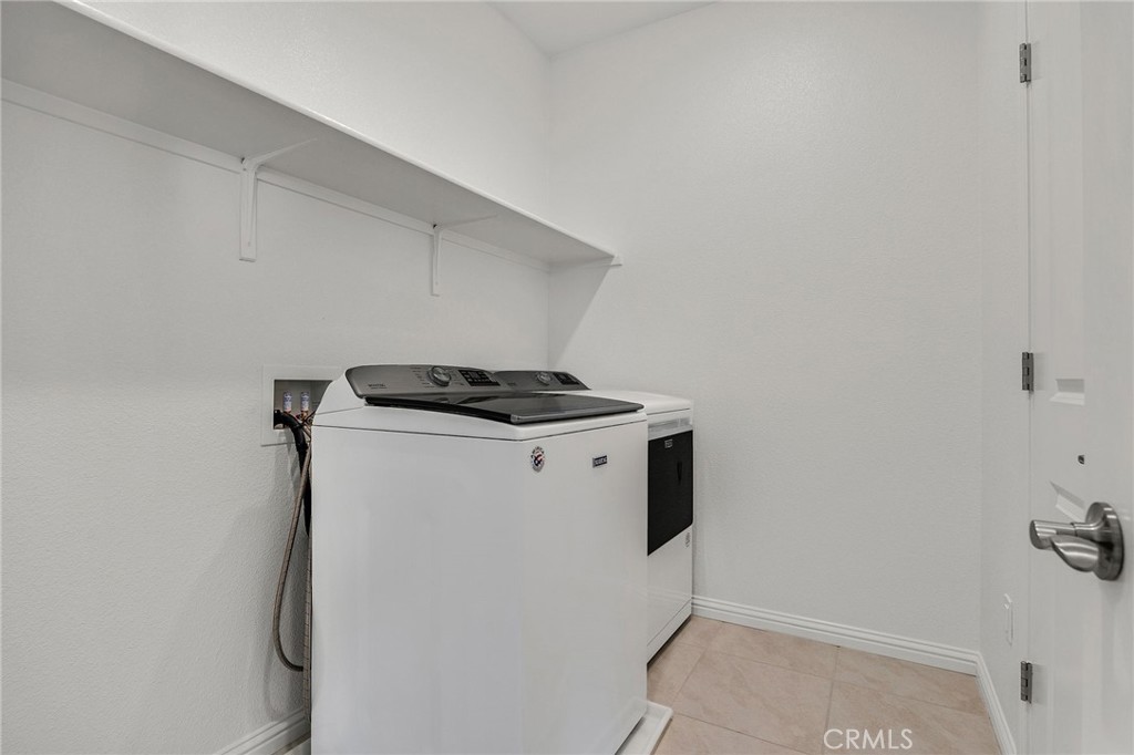 237 Goose Creek Avenue Brentwood, CA 94513 - Photo 33 of 49 a utility room with dryer and washer
