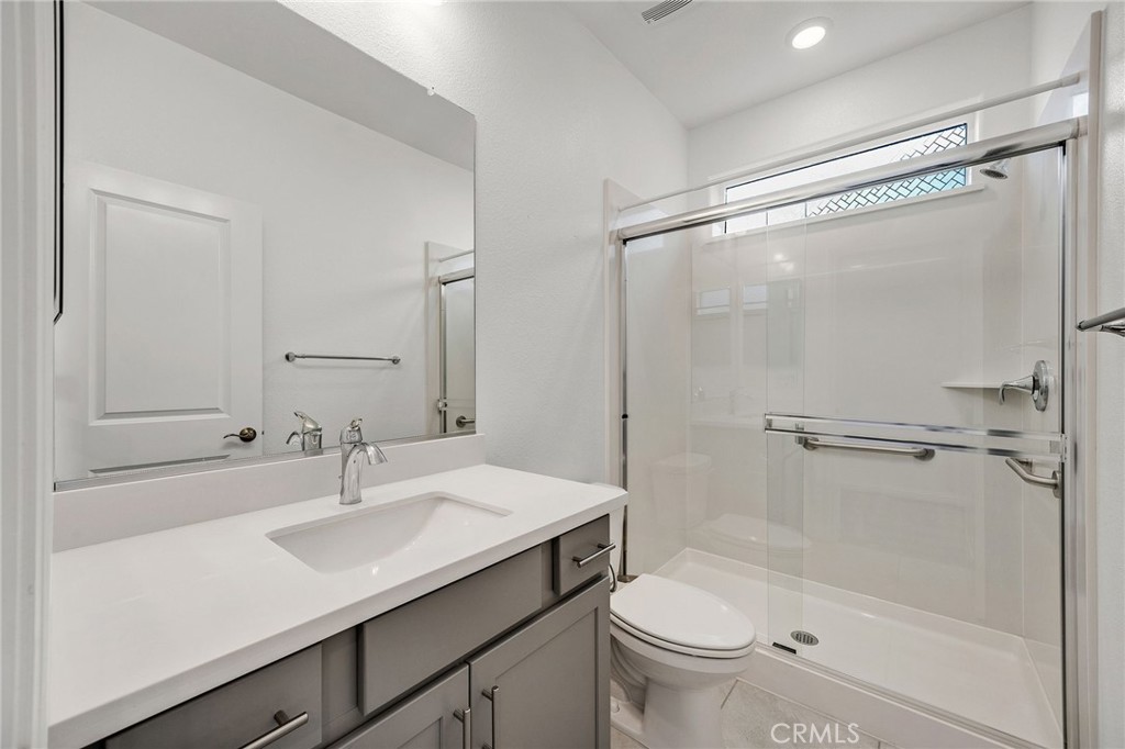 237 Goose Creek Avenue Brentwood, CA 94513 - Photo 37 of 49 a bathroom with a sink toilet and shower