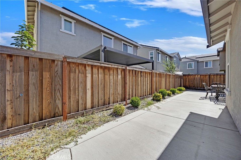 237 Goose Creek Avenue Brentwood, CA 94513 - Photo 40 of 49 a backyard of a house with sitting area and furniture