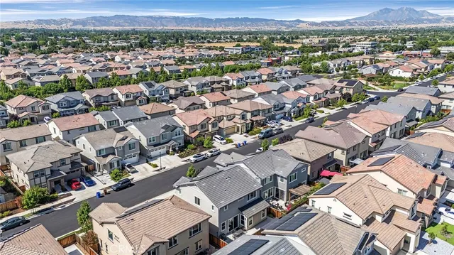 an aerial view of a city with lots of residential buildings