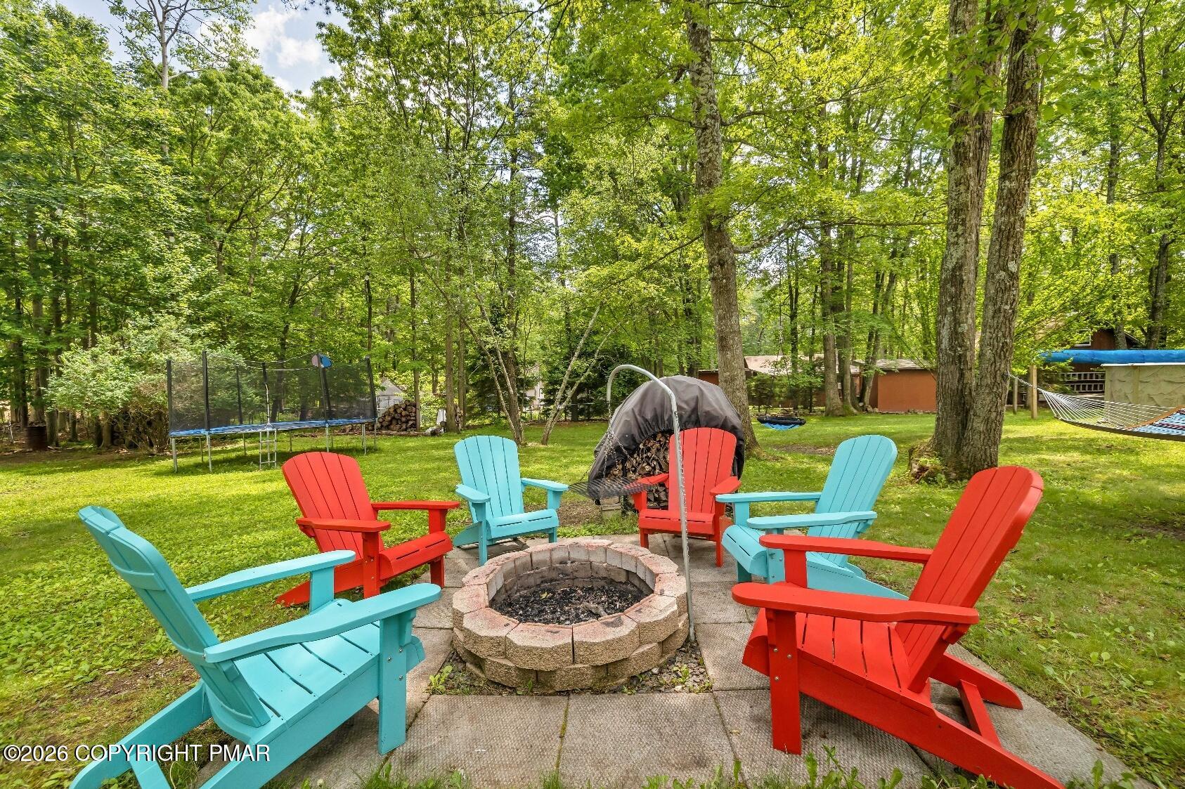 1106 Lakeside Drive Effort, PA 18330 - Photo 12 of 42 a backyard of a house with outdoor seating