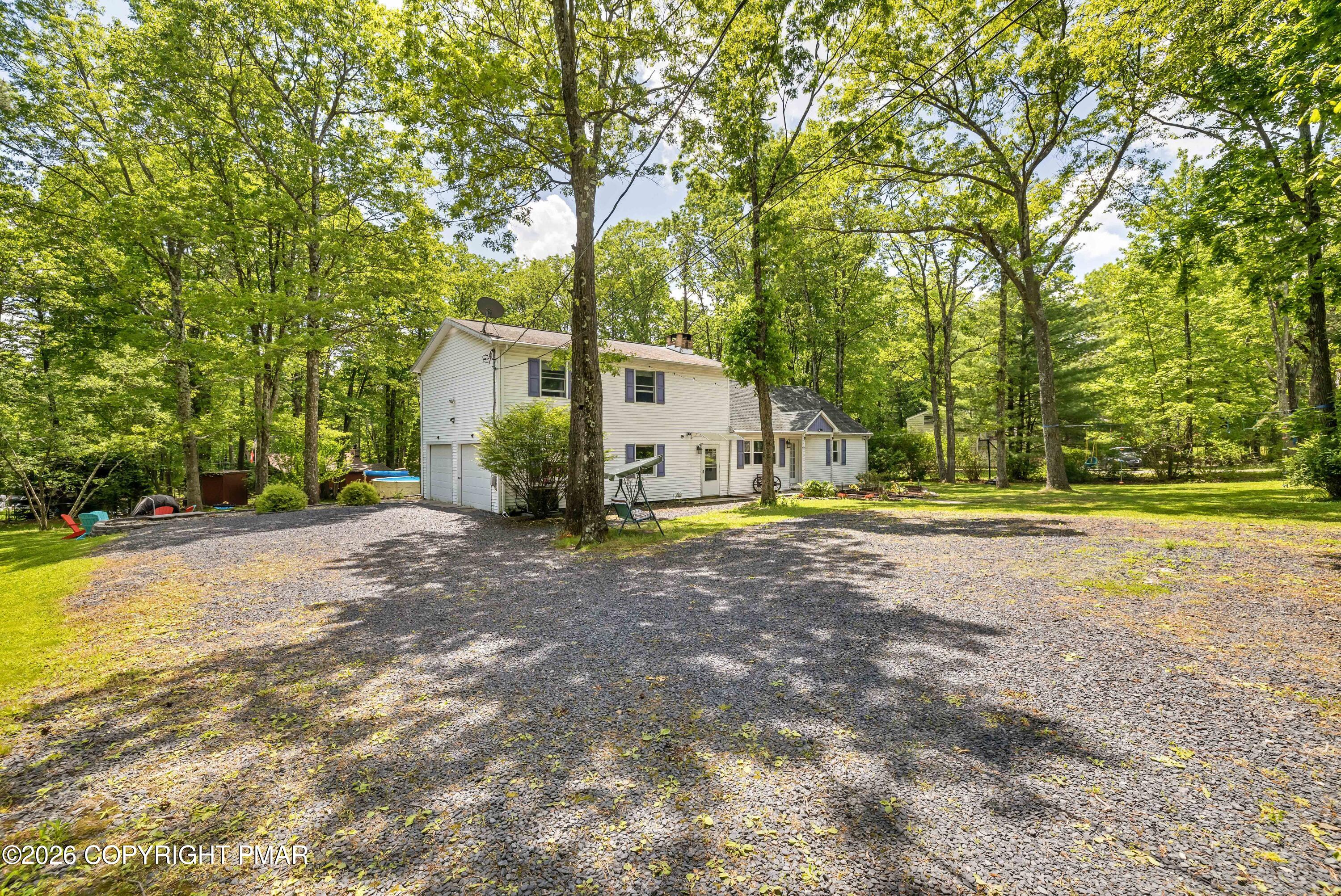 1106 Lakeside Drive Effort, PA 18330 - Photo 5 of 42 a view of a house with backyard and tree