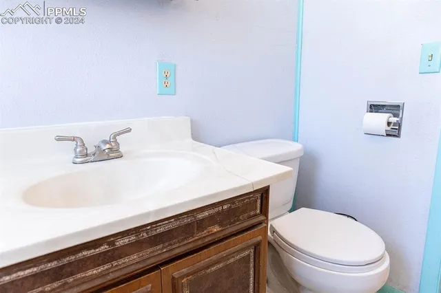 a bathroom with a sink and a toilet