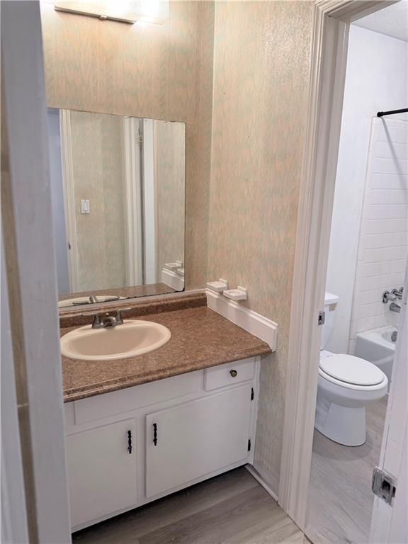 3237 Abbeywood Drive Decatur, GA 30034 - Photo 12 of 12 a bathroom with a granite countertop sink and a mirror