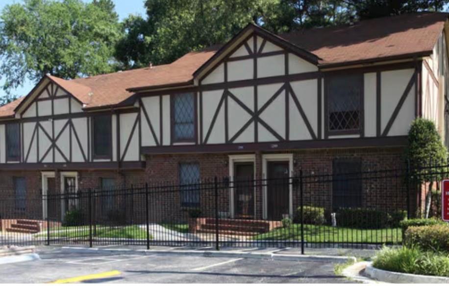 3237 Abbeywood Drive Decatur, GA 30034 - Photo 2 of 12 a front view of a house with a garden