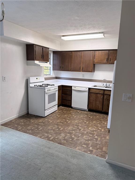 3237 Abbeywood Drive Decatur, GA 30034 - Photo 9 of 12 a kitchen with a sink and white cabinets