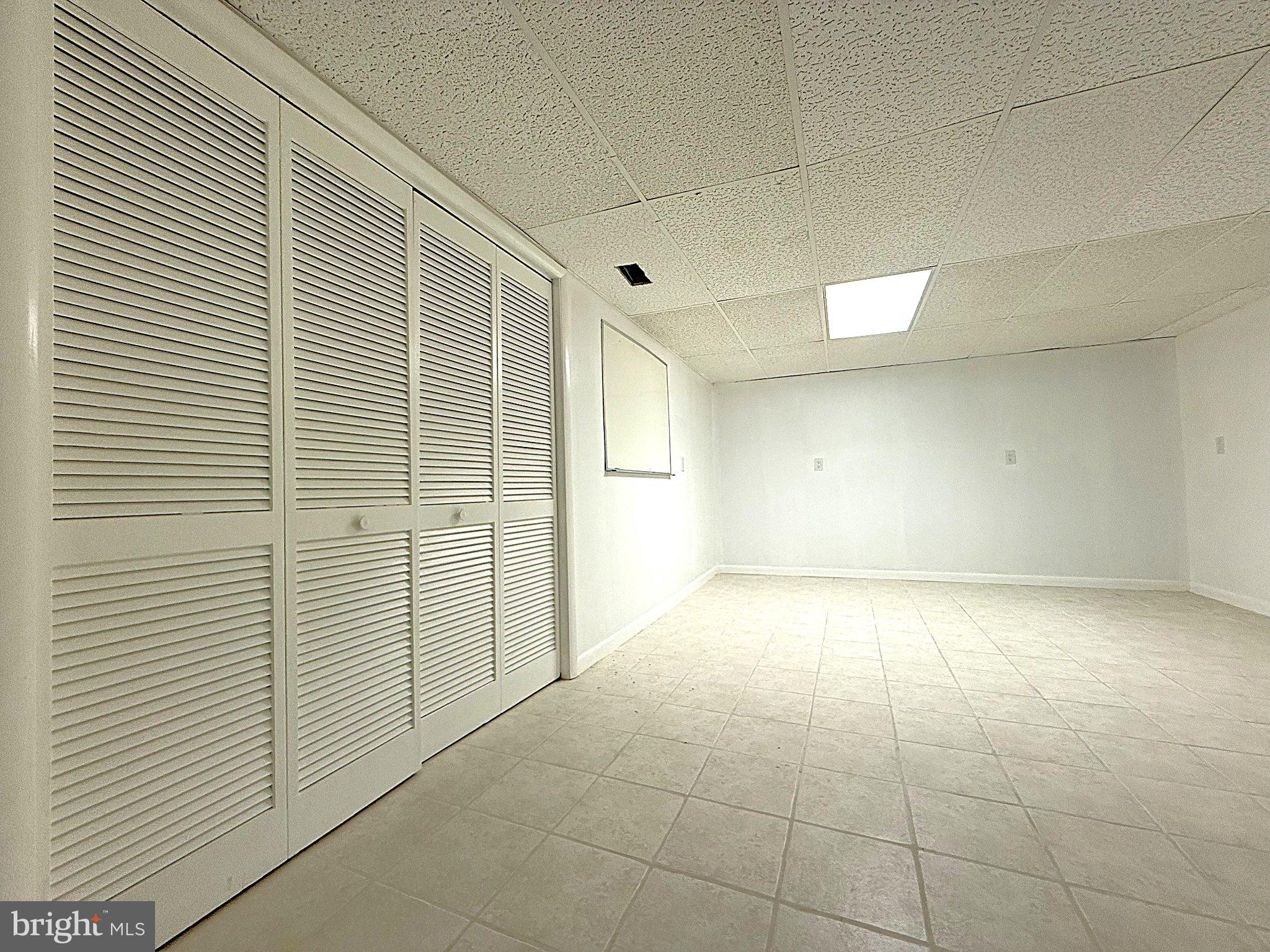 404 Woodbrook Road Lancaster, VA 22503 - Photo 55 of 60 a view of an empty room with a window