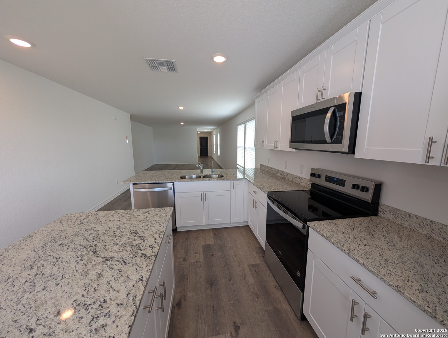 862 Bluegrass New Braunfels, TX 78130 - Photo 11 of 37 a kitchen that has a sink and a stove top oven