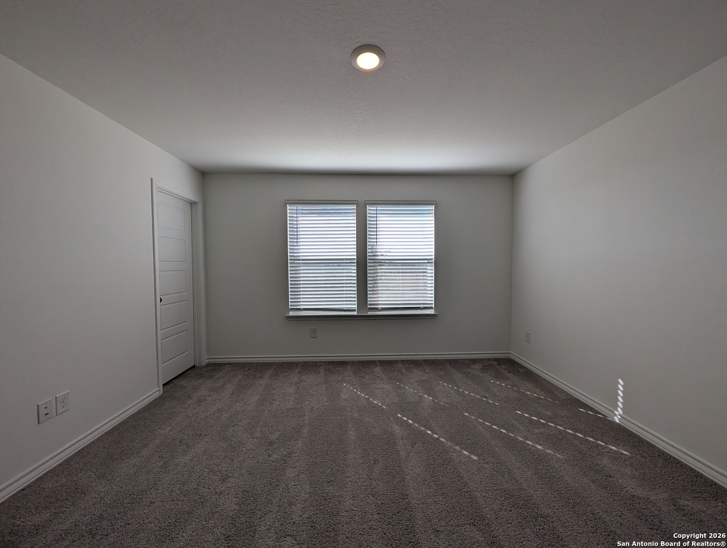 862 Bluegrass New Braunfels, TX 78130 - Photo 13 of 37 an empty room with windows