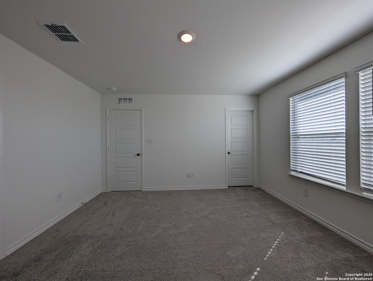 862 Bluegrass New Braunfels, TX 78130 - Photo 14 of 37 a view of an empty room with a window