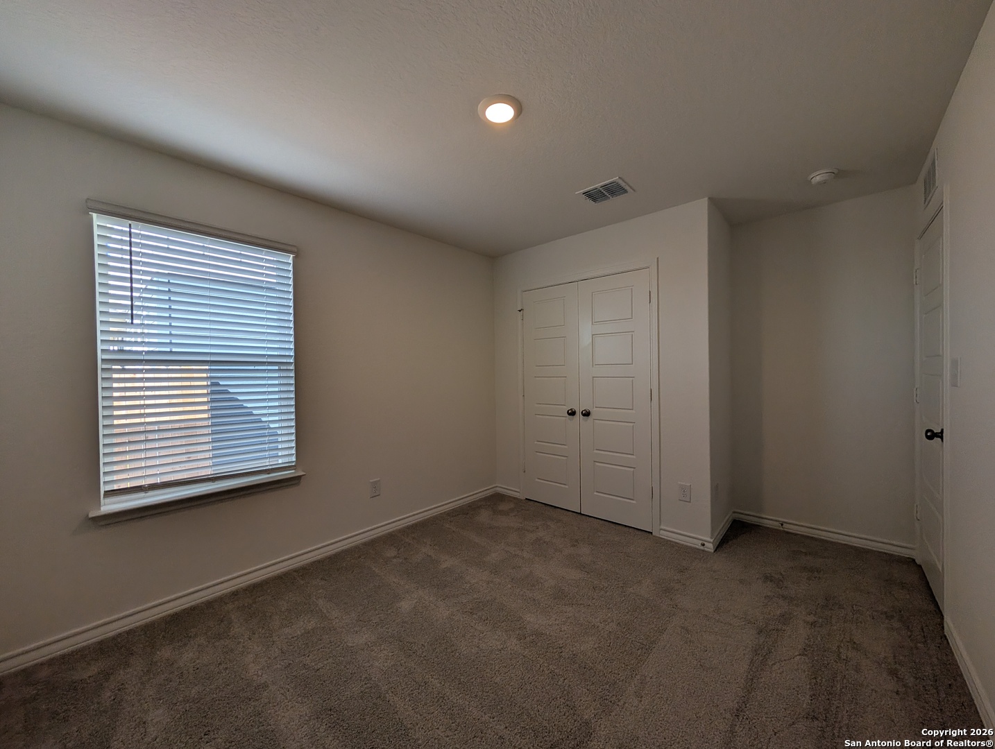 862 Bluegrass New Braunfels, TX 78130 - Photo 20 of 37 a view of an empty room with a window