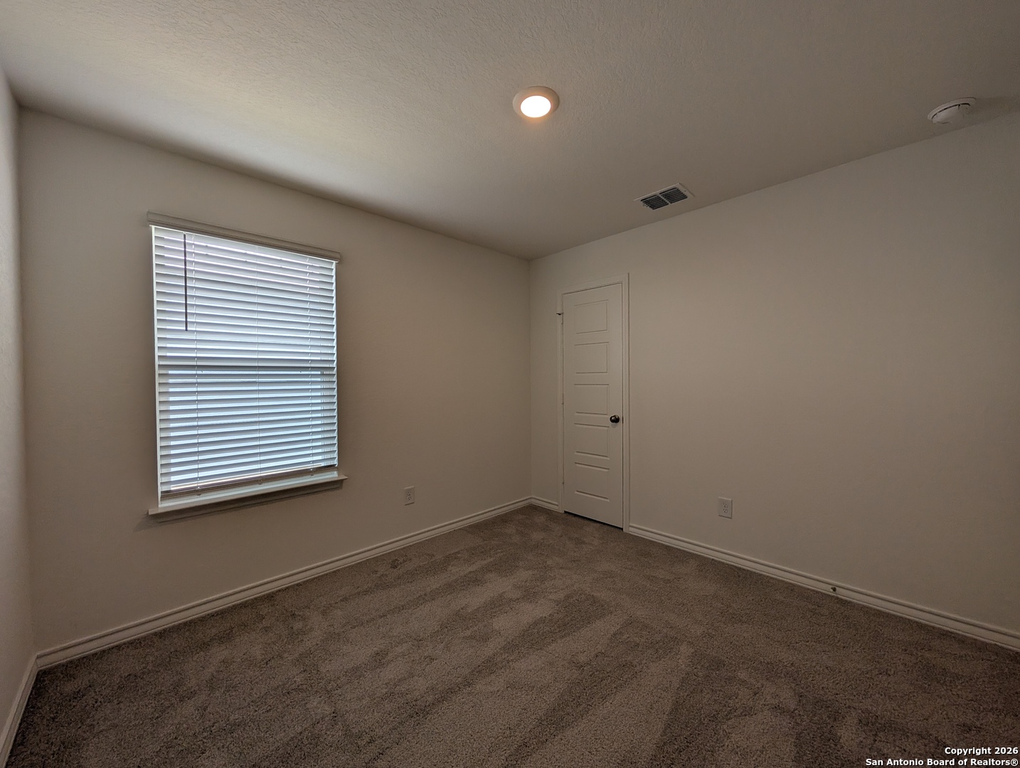 862 Bluegrass New Braunfels, TX 78130 - Photo 25 of 37 an empty room with a window