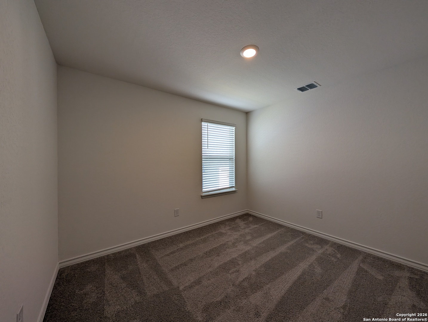 862 Bluegrass New Braunfels, TX 78130 - Photo 26 of 37 a view of an empty room with a window
