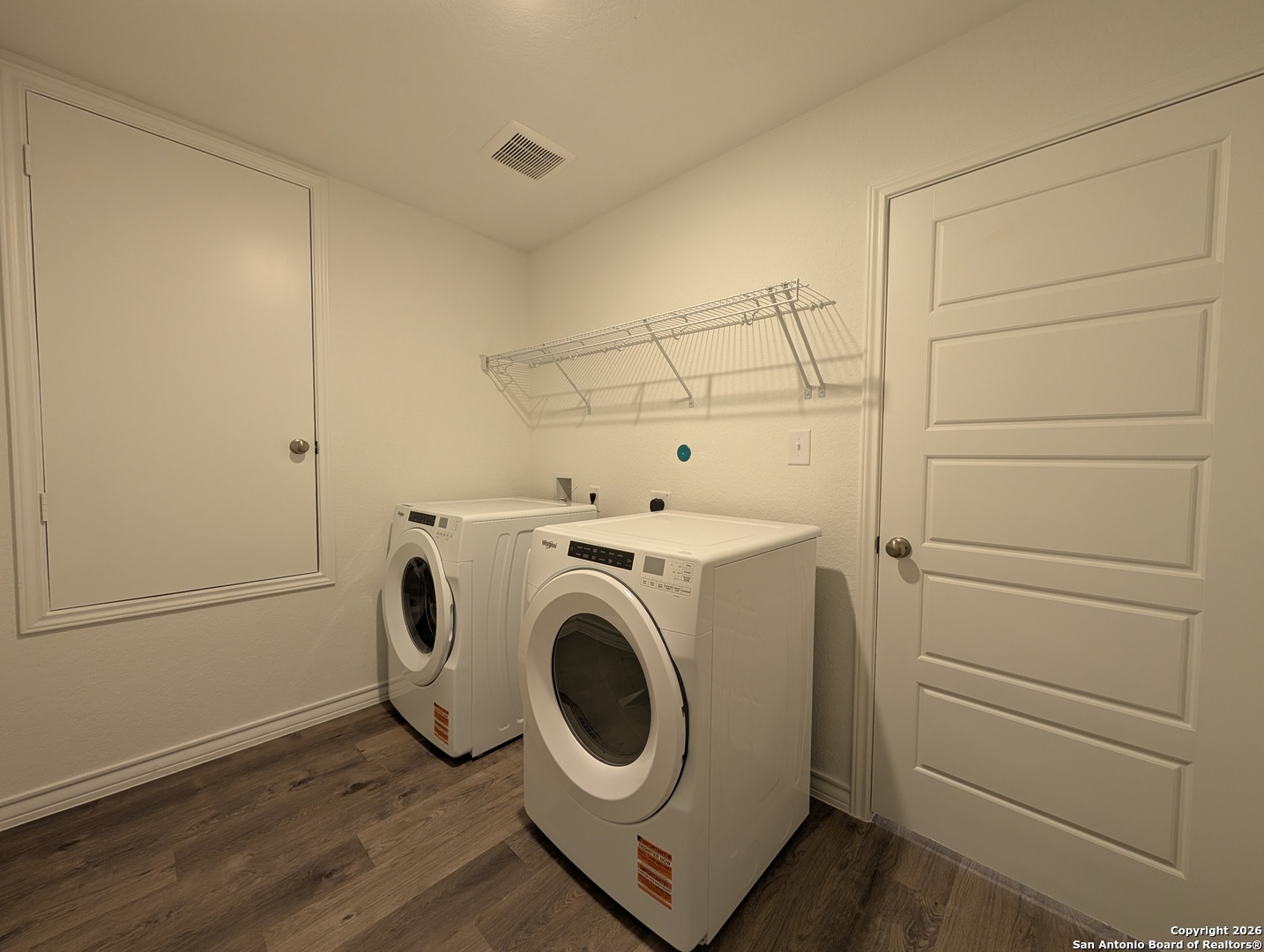 862 Bluegrass New Braunfels, TX 78130 - Photo 27 of 37 a utility room with dryer and washer