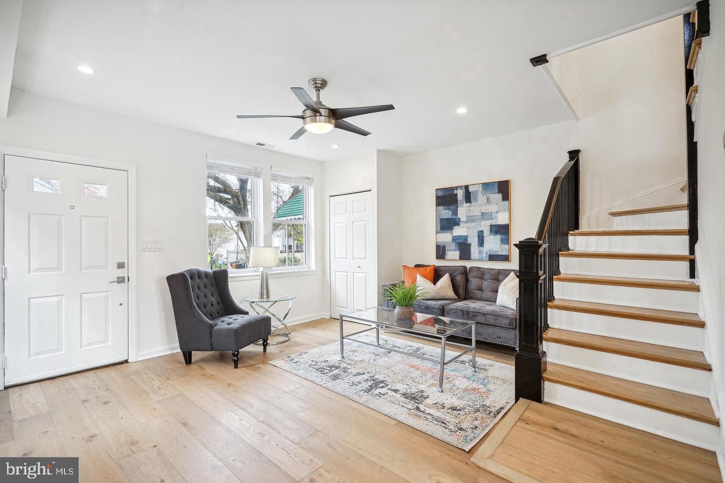 325 17th Street Southeast Washington, DC 20003 - Photo 3 of 11 a living room with furniture and a wooden floor
