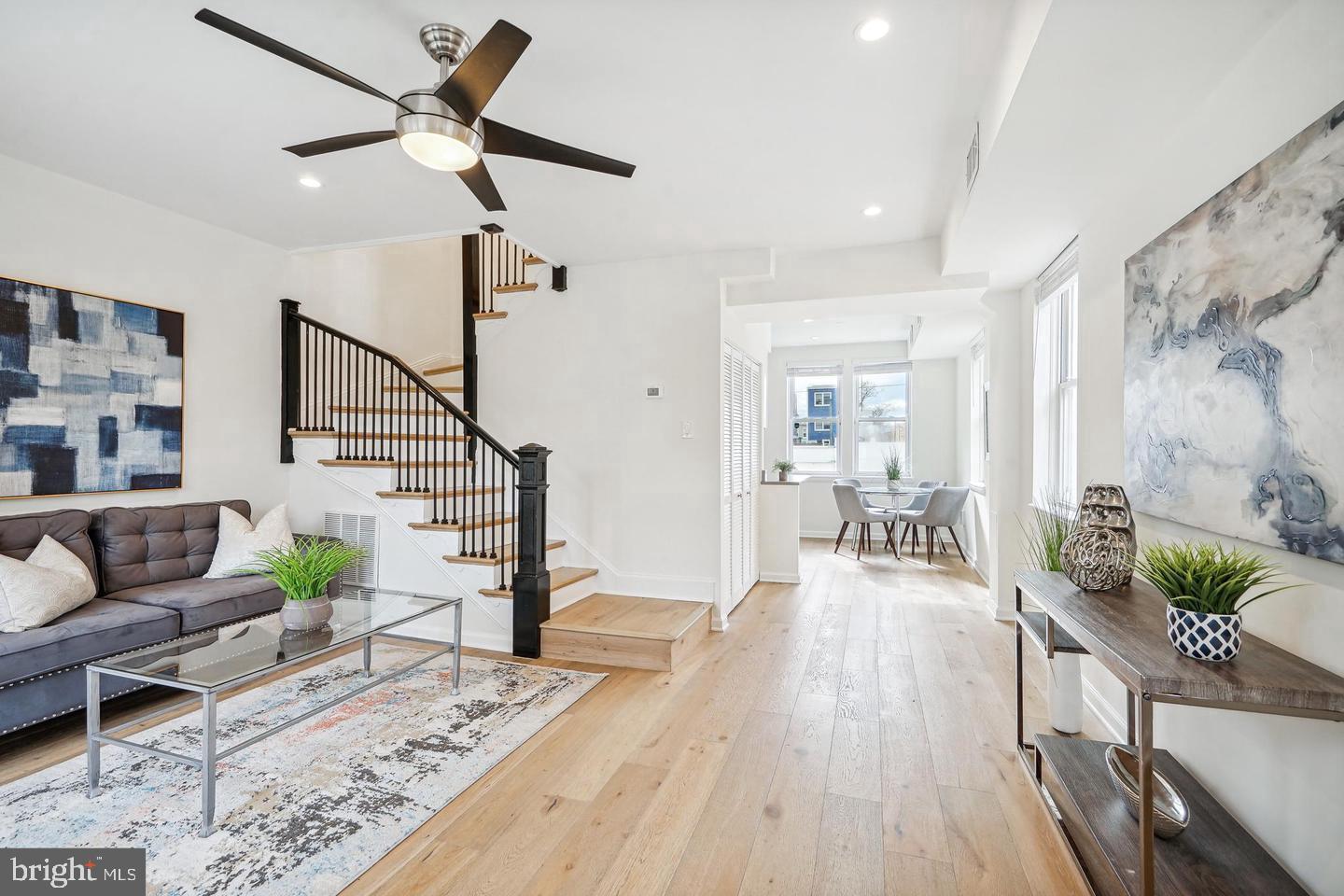 325 17th Street Southeast Washington, DC 20003 - Photo 4 of 11 a living room with furniture and wooden floor