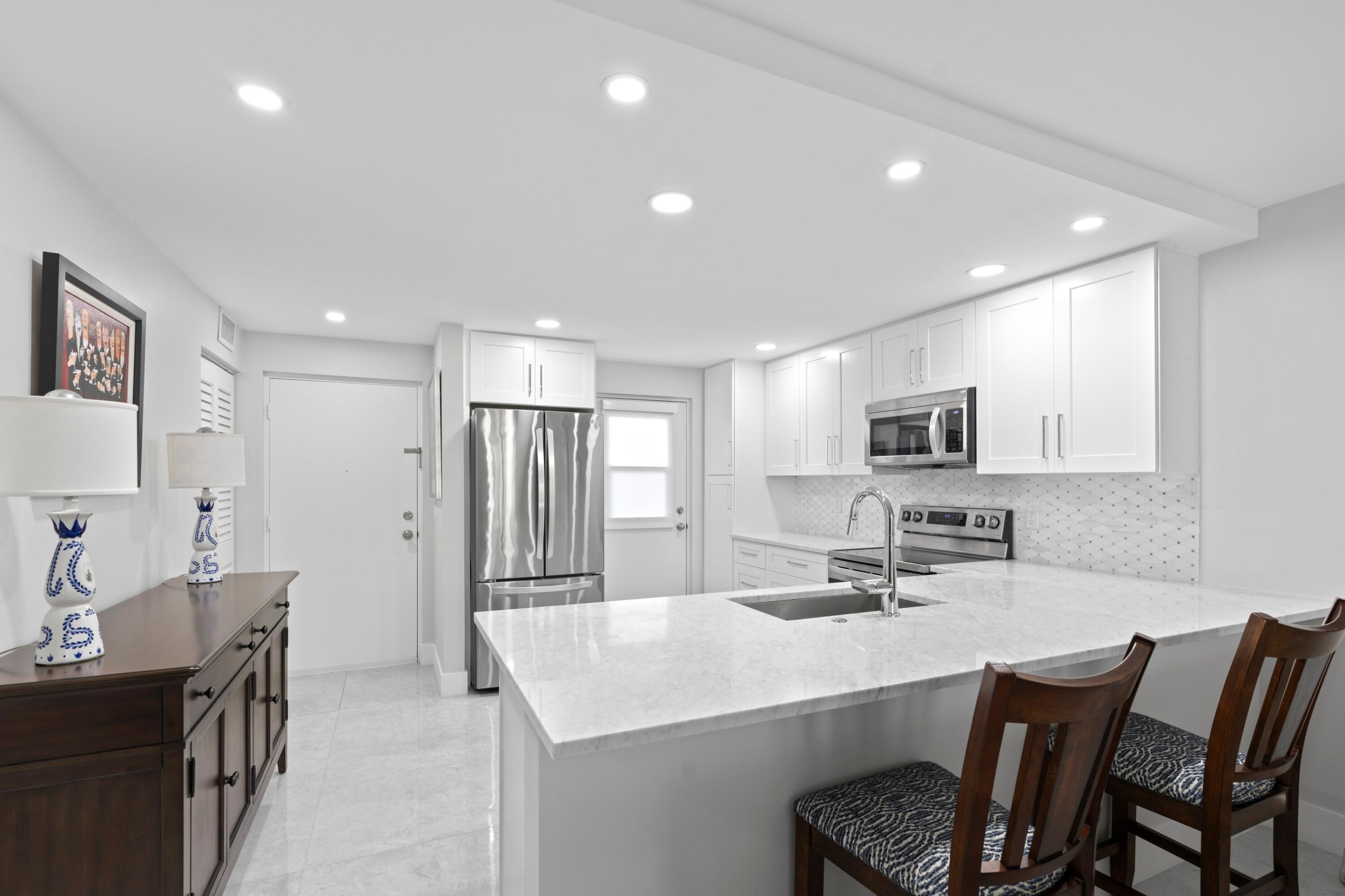 5700 Northwest 2nd Avenue, Unit 103 Boca Raton, FL 33487 - Photo 2 of 25 Kitchen