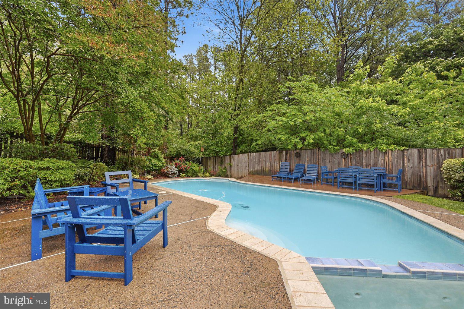 911 Riva Ridge Drive Great Falls, VA 22066 - Photo 47 of 55 Tranquil poolside retreat in nature.
