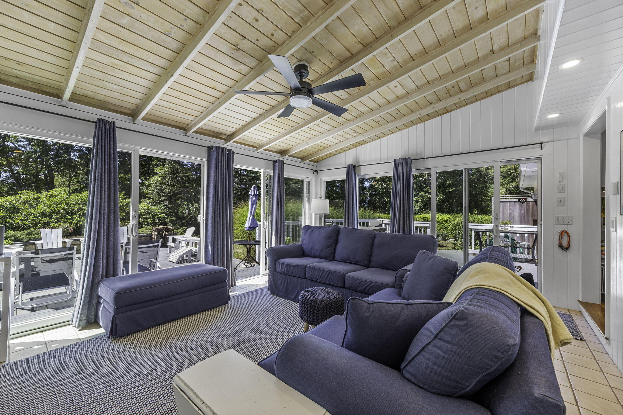 73 Joshua Jethro Road Chatham, MA 02633 - Photo 13 of 53 a living room with furniture and a large window