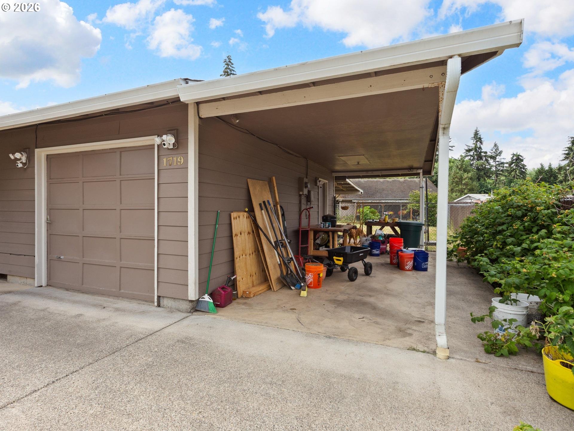 1719 Southwest 1st Street Battle Ground, WA 98604 - Photo 4 of 37 a view of a garage with parked cars