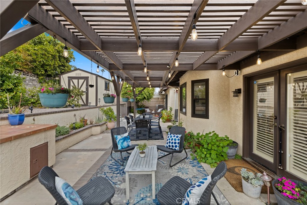 873 Calle Del Sol Upland, CA 91784 - Photo 33 of 41 a view of a chairs and table in a patio